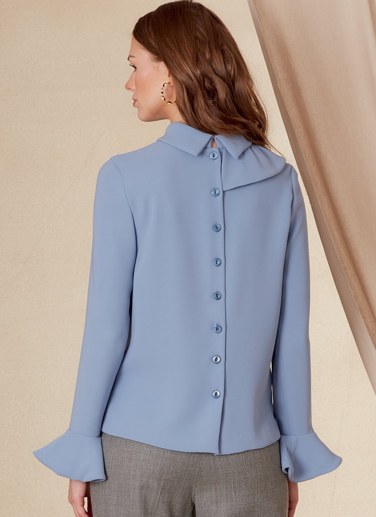 Vogue Patterns V1824 envelope showing a fitted top with bias ruffle detail