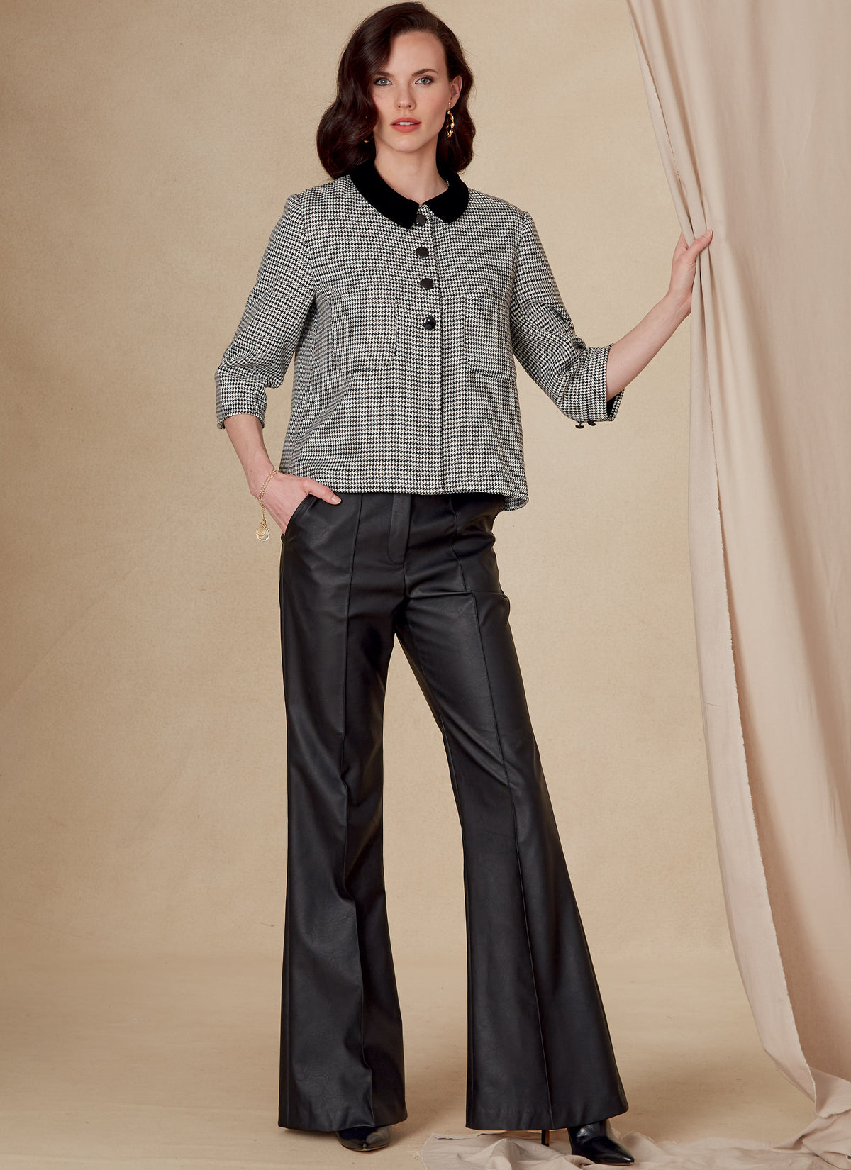 Vogue Patterns V1831 envelope showing a lined jacket with a bow detail at the back