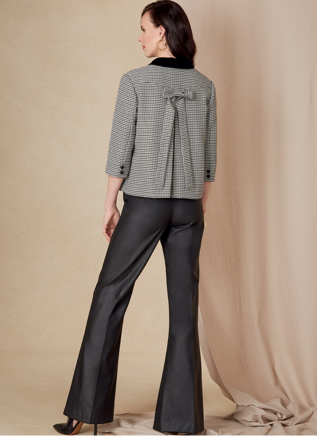 Vogue Patterns V1831 envelope showing a lined jacket with a bow detail at the back