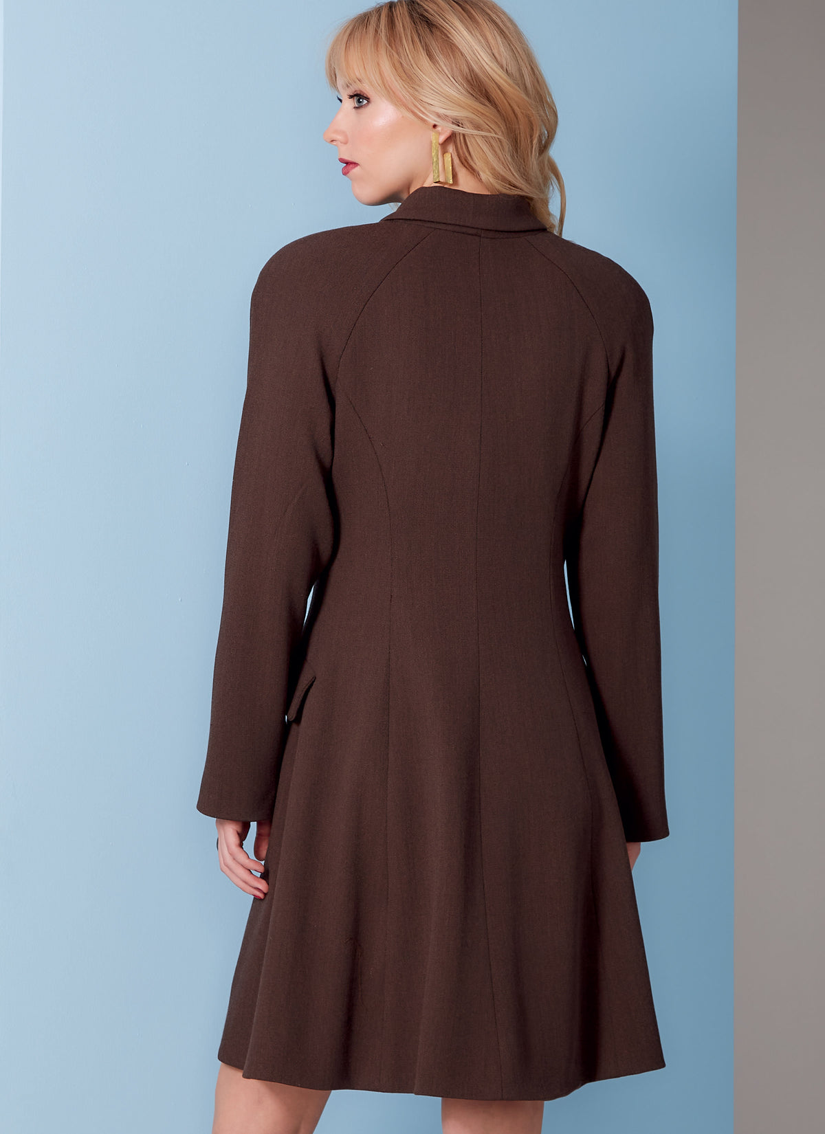 Vogue Patterns V1836 envelope showing a lined coat, loose-fitting through the bust and waist