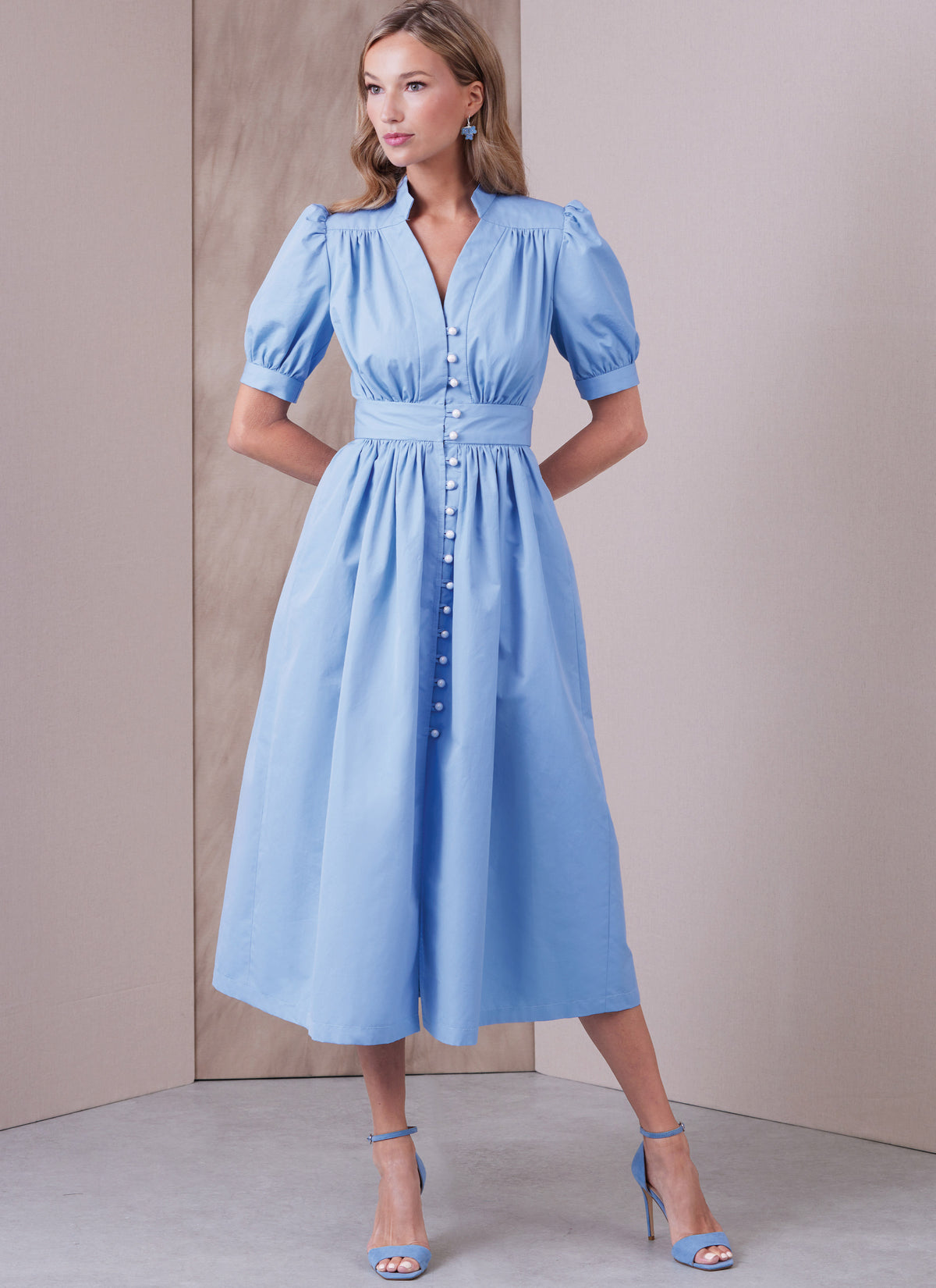 Vogue Patterns V1934 envelope showing the dress with a stand collar and raised waist