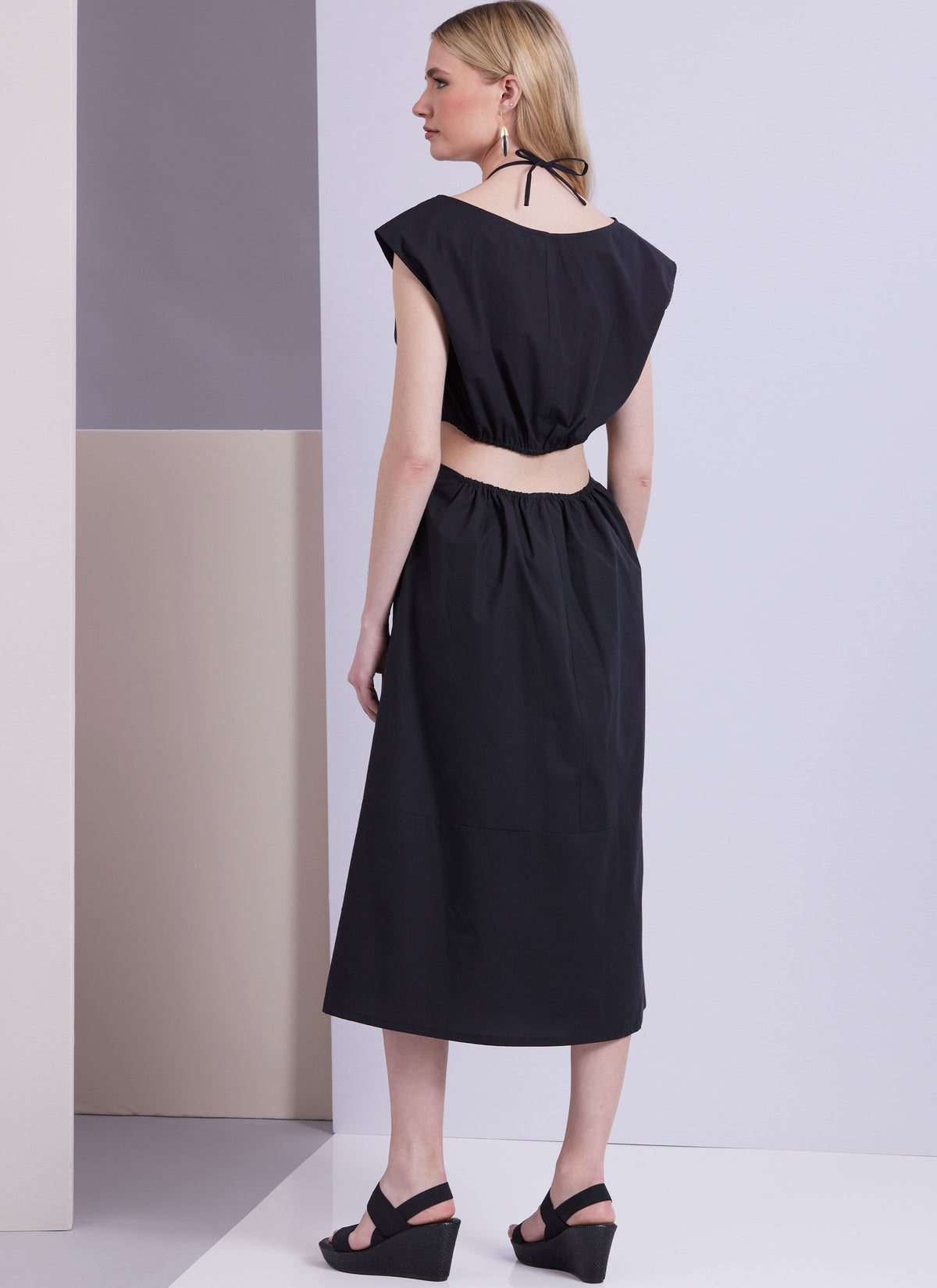 Vogue Patterns V1951 envelope showing the A-line midi dress with cut-out details
