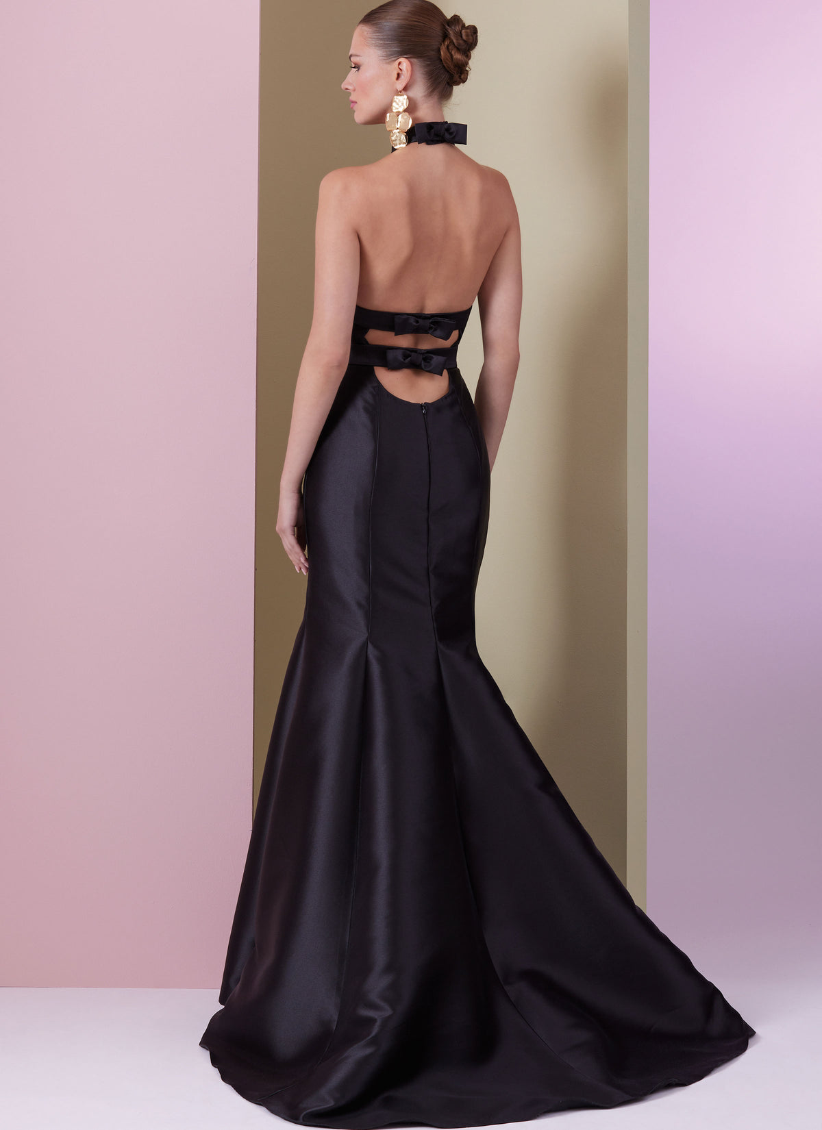Vogue Patterns V2010 envelope showing open back trumpet dress designs