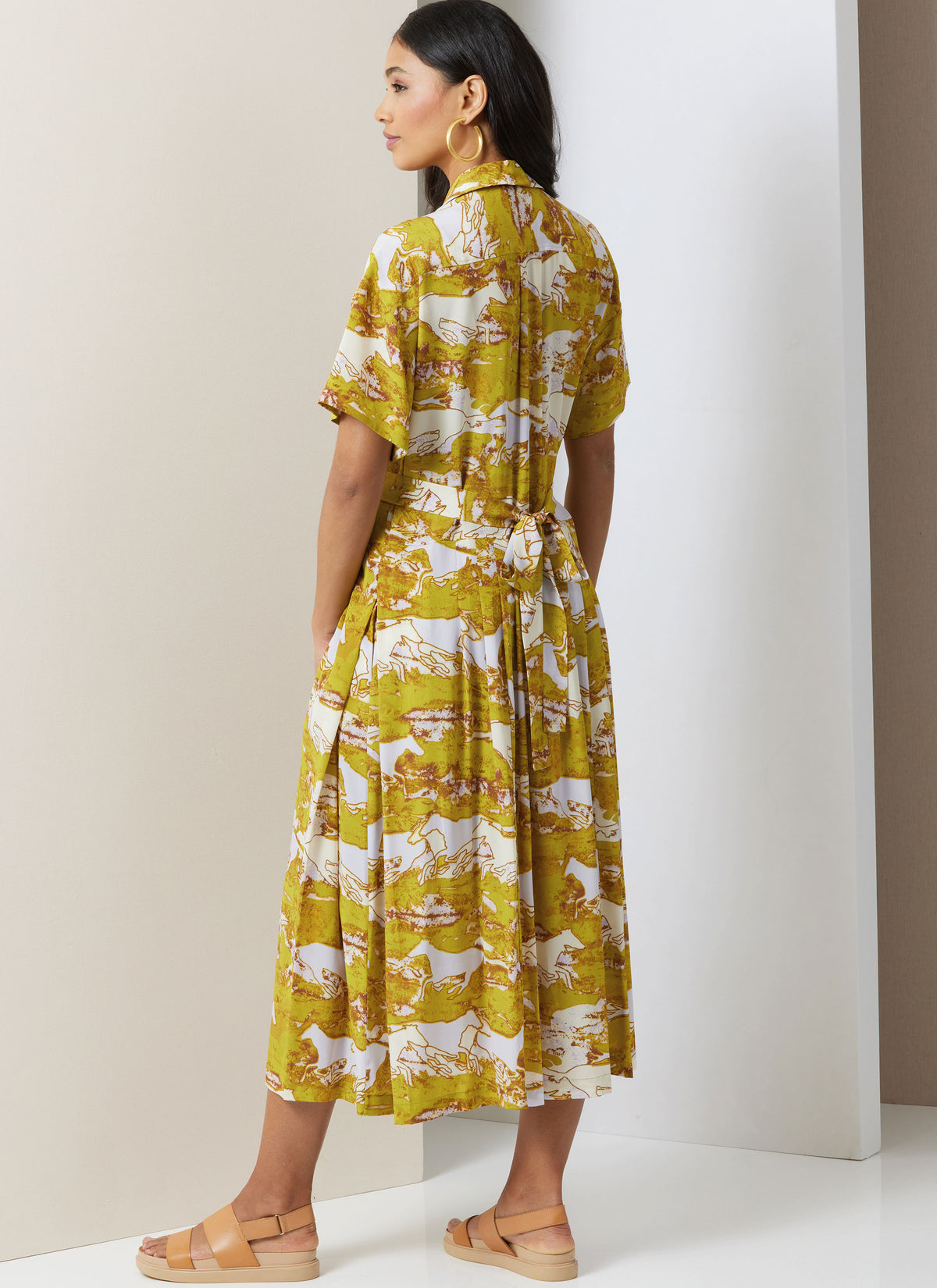 Vogue Patterns V2024 envelope showing midi dress designs
