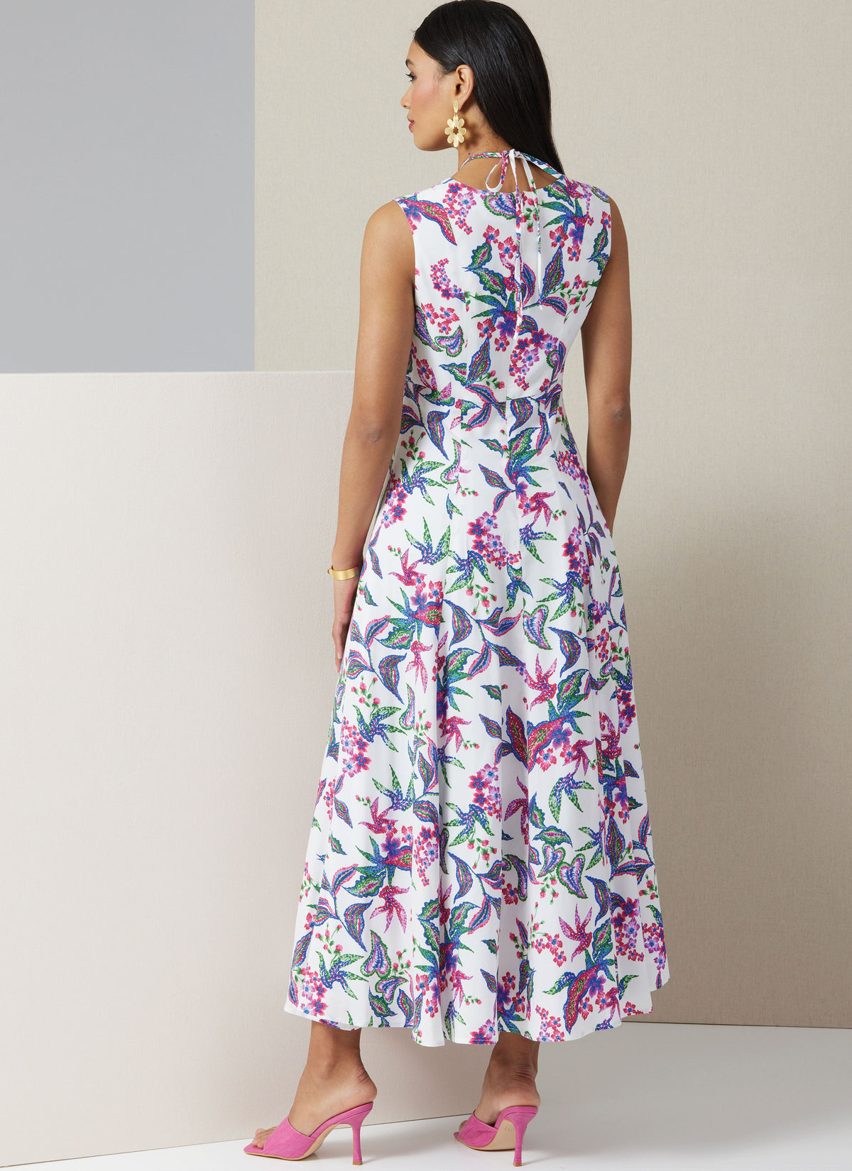 Vogue Patterns V2025 envelope showing fit and flare cut-out dress designs
