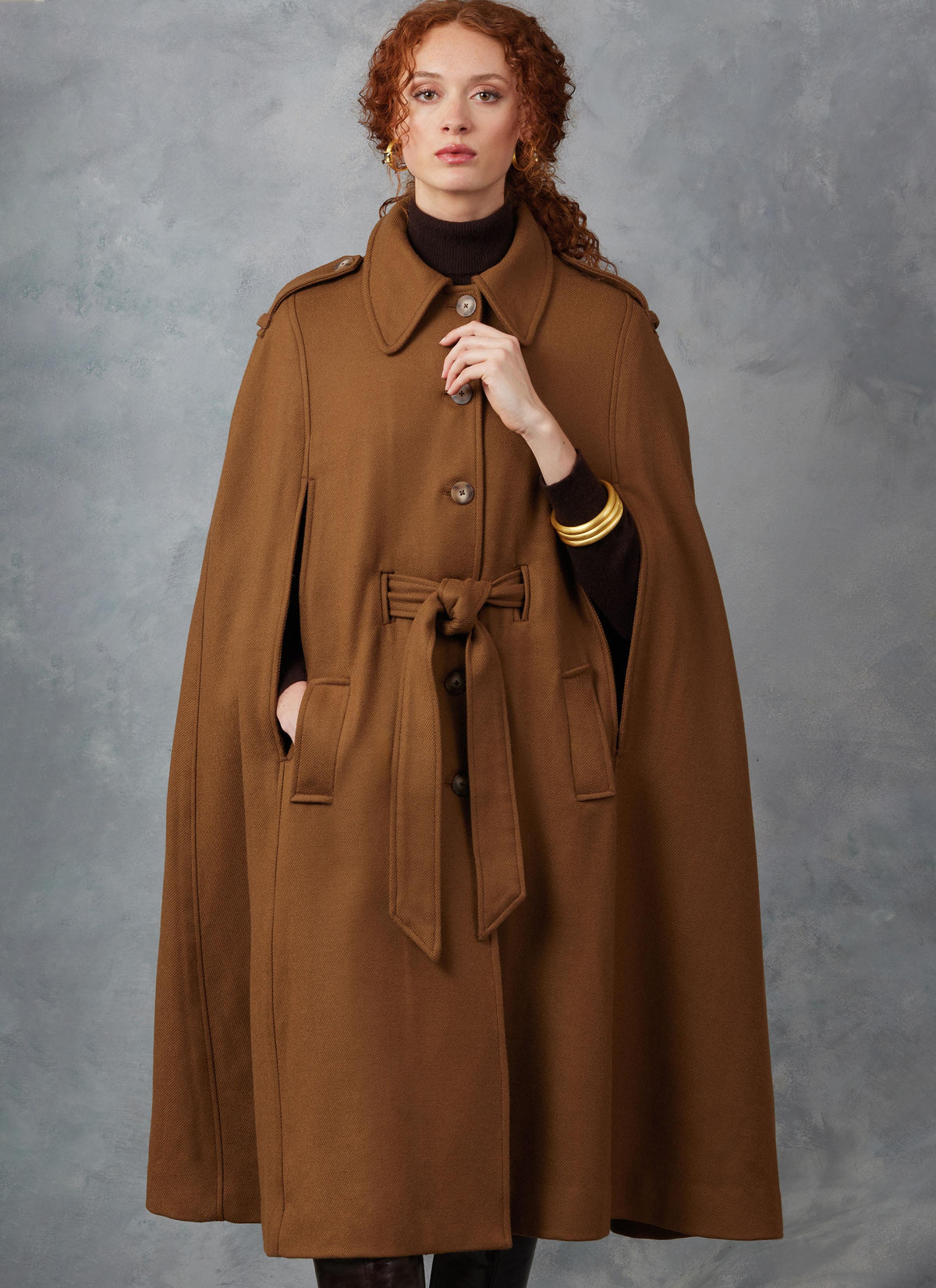 Vogue Patterns V2054 pattern envelope showing an unlined cape