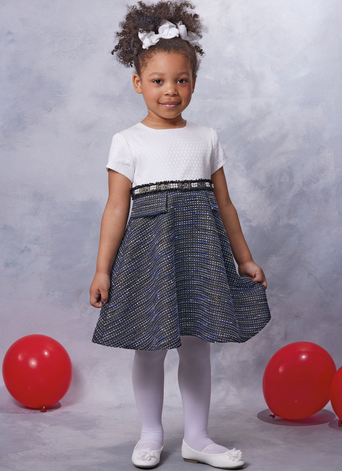 Vogue Patterns V2058 pattern envelope showing a lined girls' dress