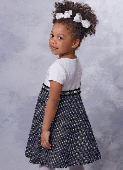 Vogue Patterns V2058 pattern envelope showing a lined girls' dress