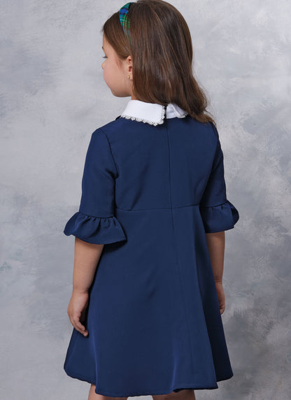 Vogue Patterns V2058 pattern envelope showing a lined girls' dress