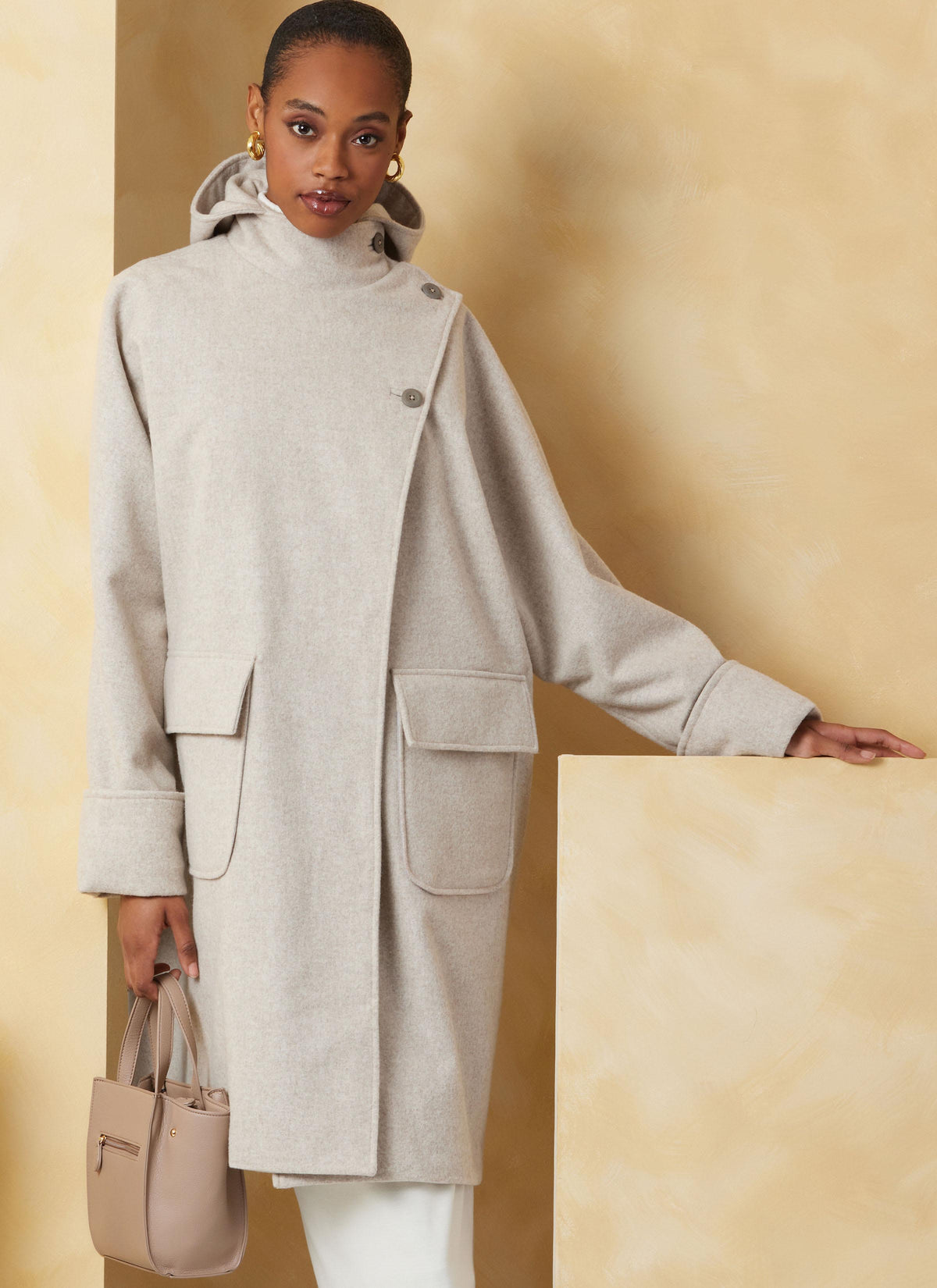 Vogue Patterns V2075 pattern envelope showing the coat designs