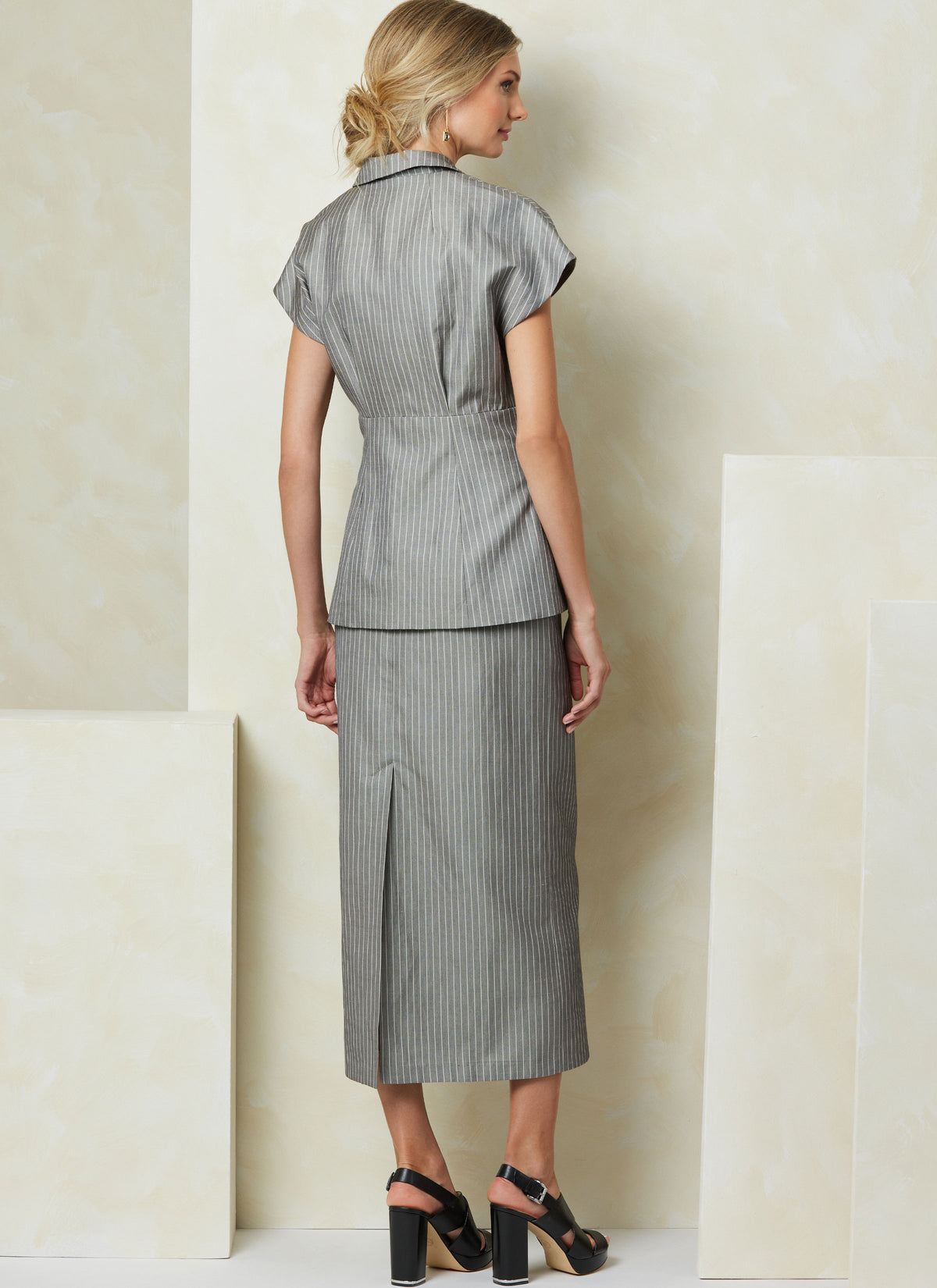 Vogue Patterns V2097 envelope showing the v-neck top designs