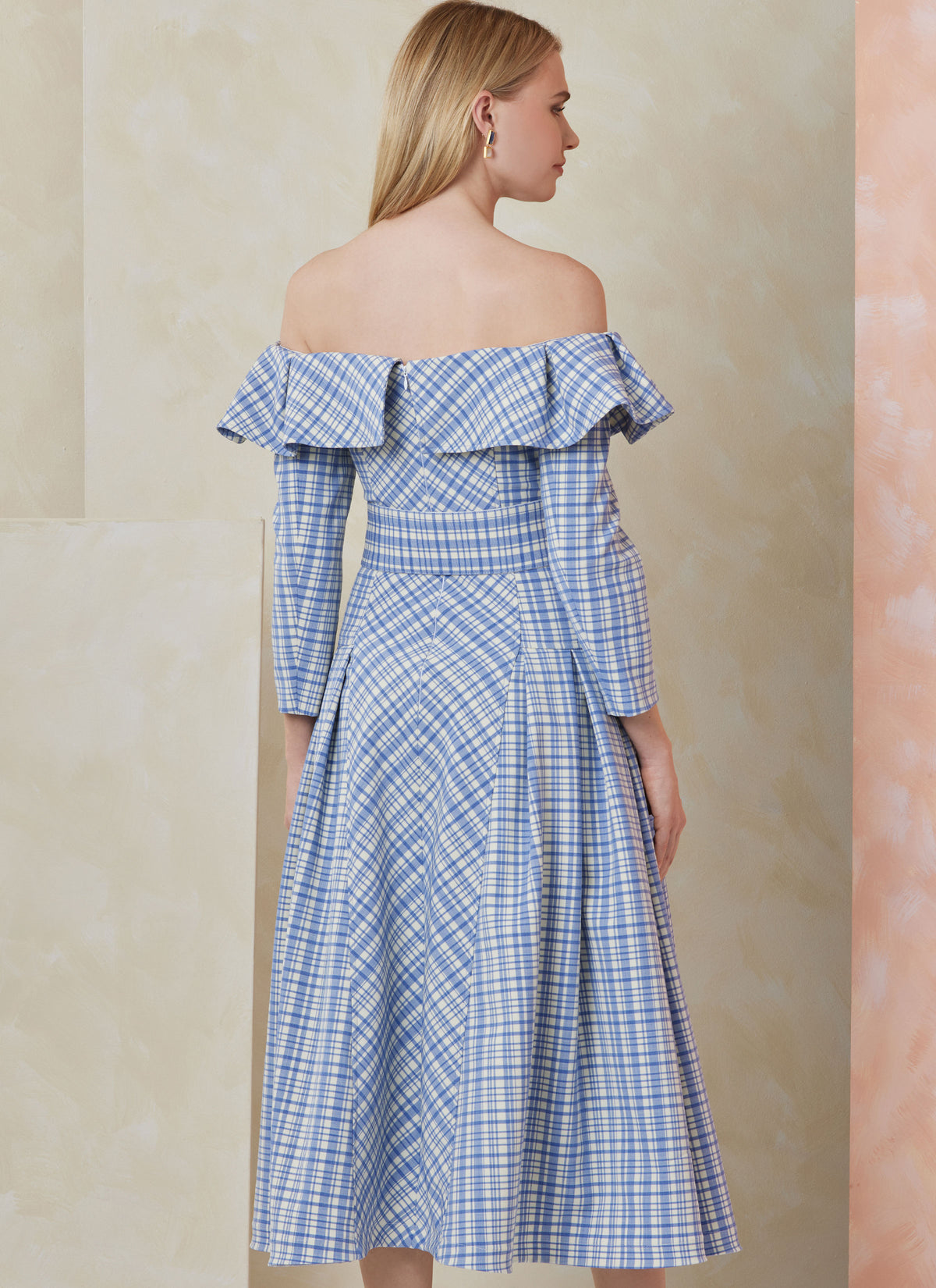 Vogue Patterns V2104 envelope showing the off-the-shoulder midi dress designs