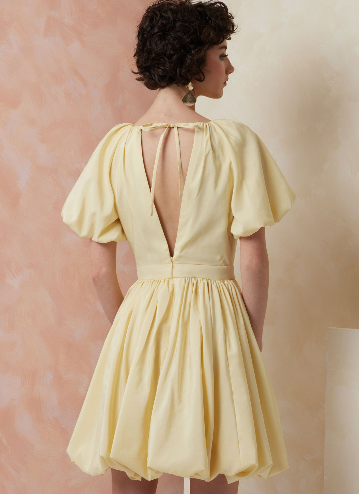 Vogue Patterns V2106 envelope showing the bubble hem dress designs