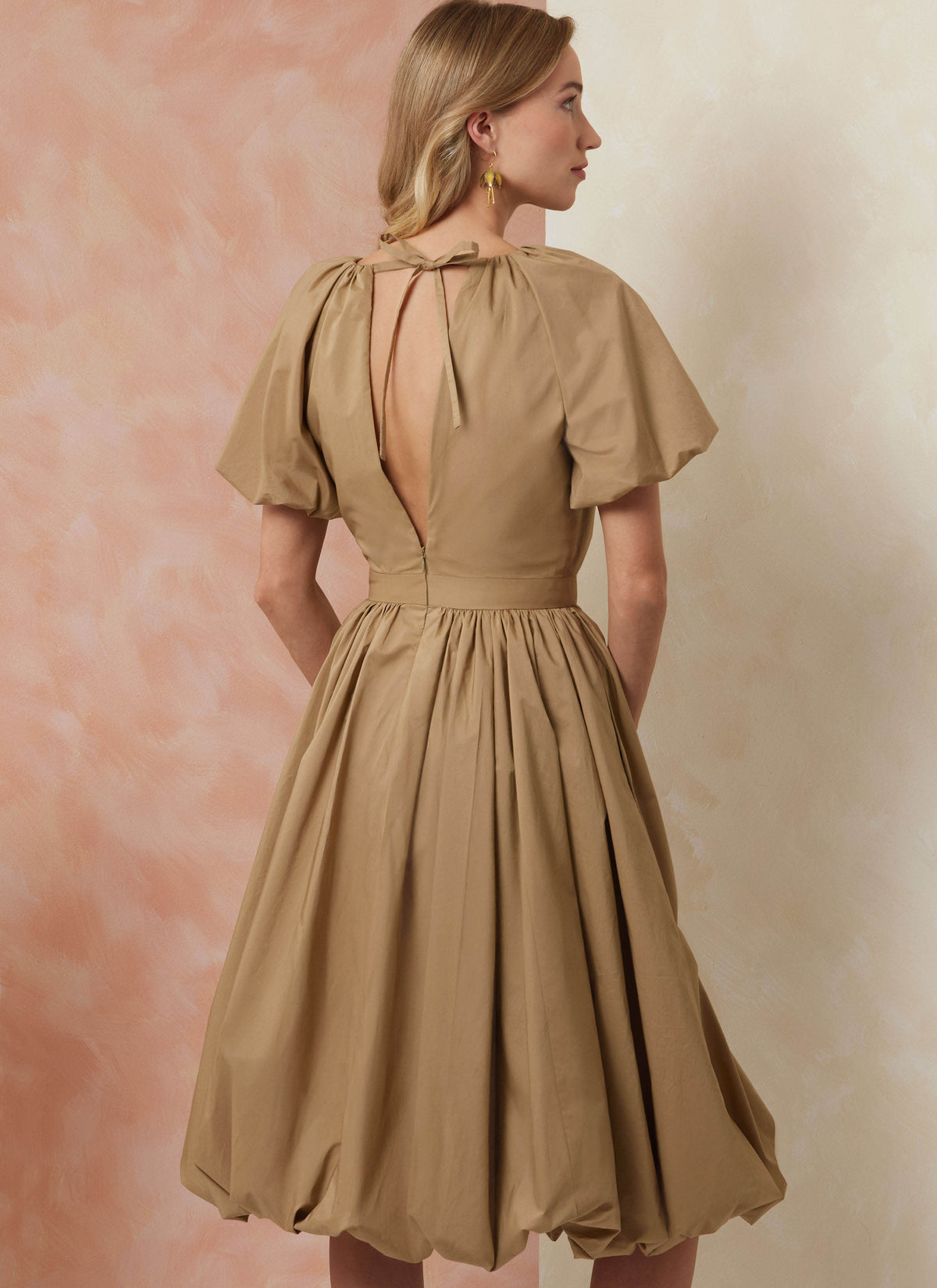 Vogue Patterns V2106 envelope showing the bubble hem dress designs