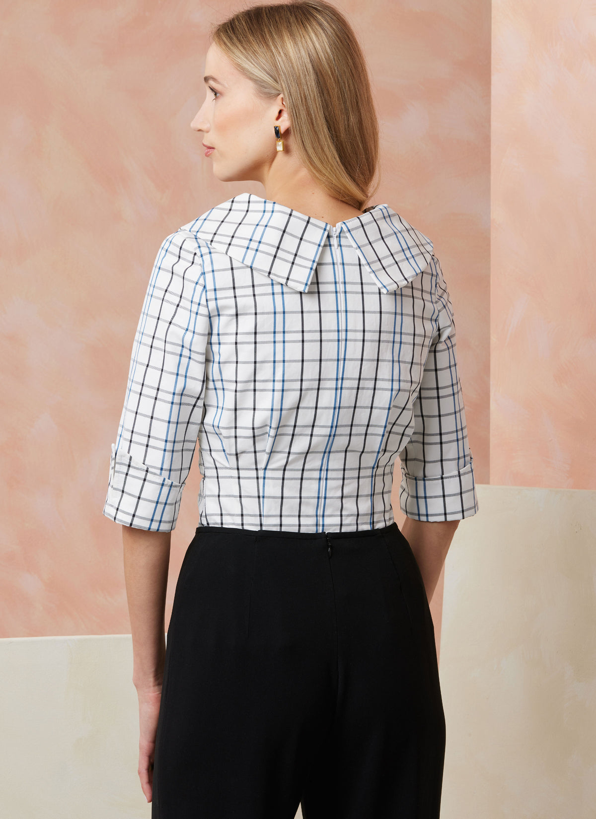 Vogue Patterns V2113 envelope showing the fitted v-neck top designs