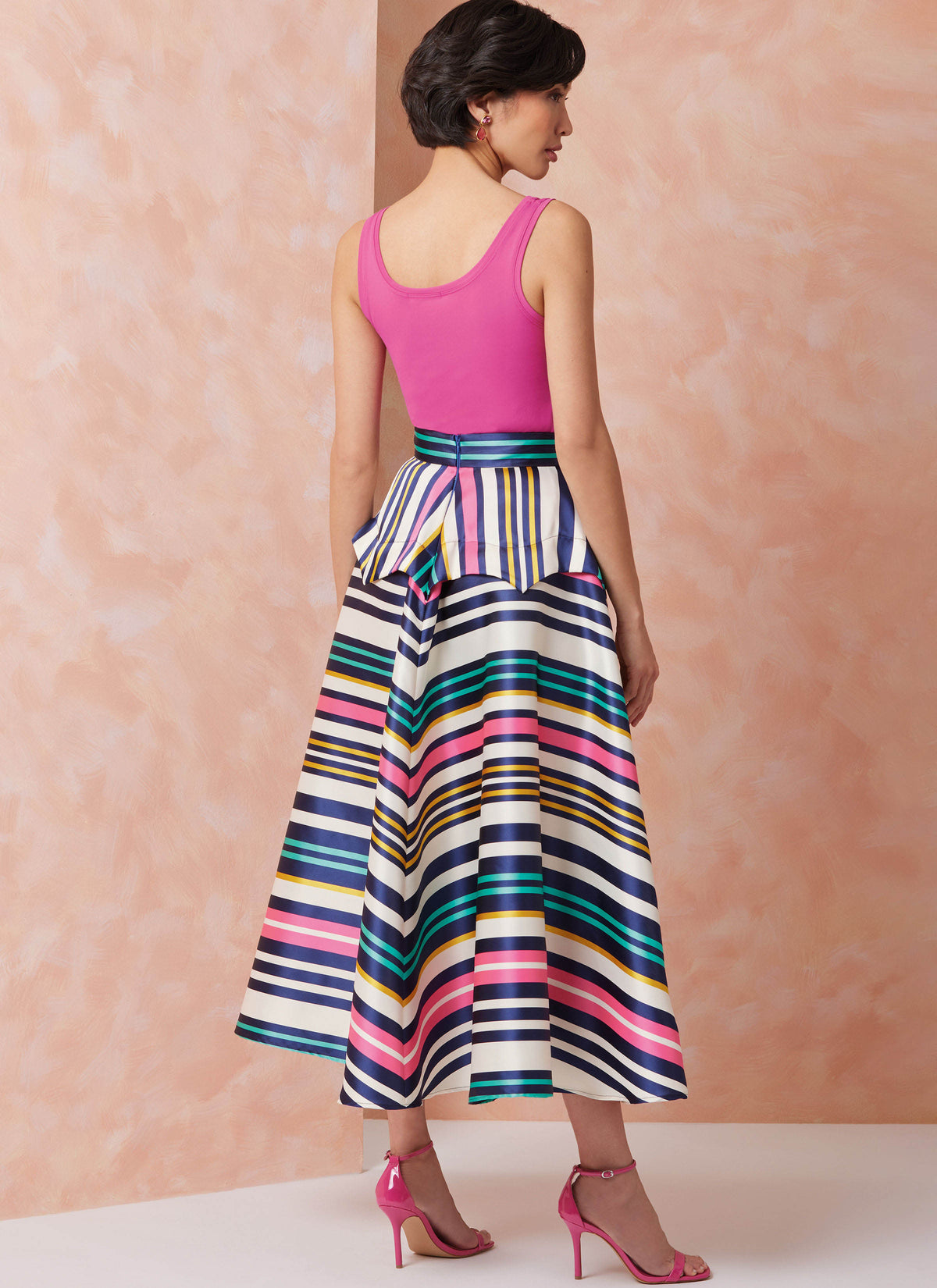 Vogue Patterns V2116 envelope showing the peplum skirt designs