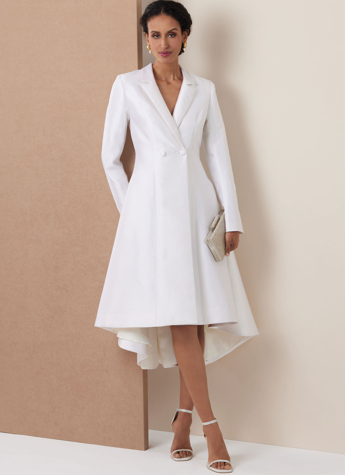 Vogue Patterns V2125 envelope showing the coat dress designs