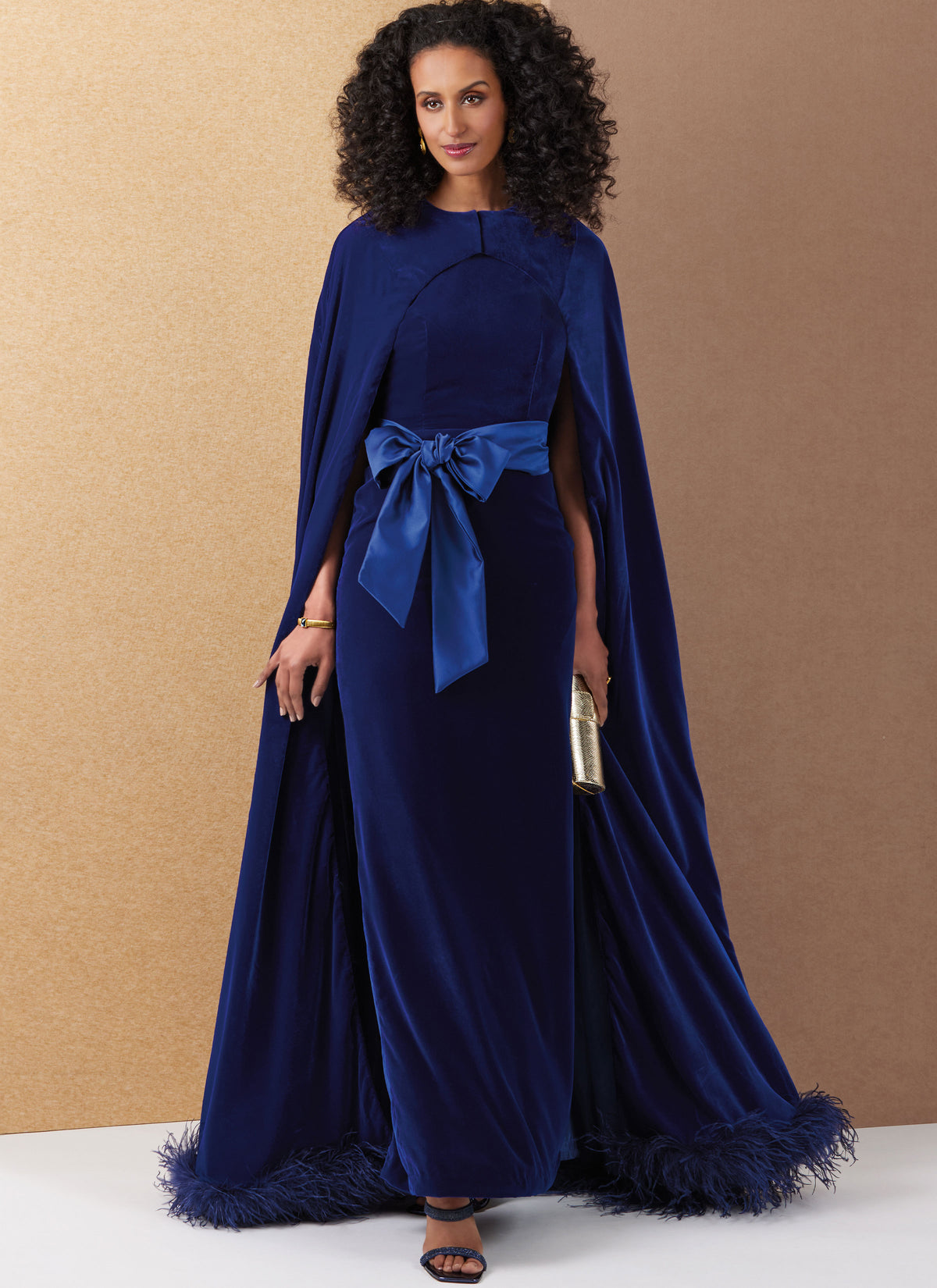 Vogue Patterns V2132 envelope showing the lined cape designs