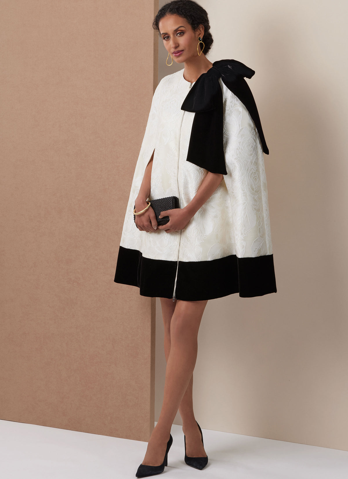 Vogue Patterns V2133 envelope showing the oversized cape designs
