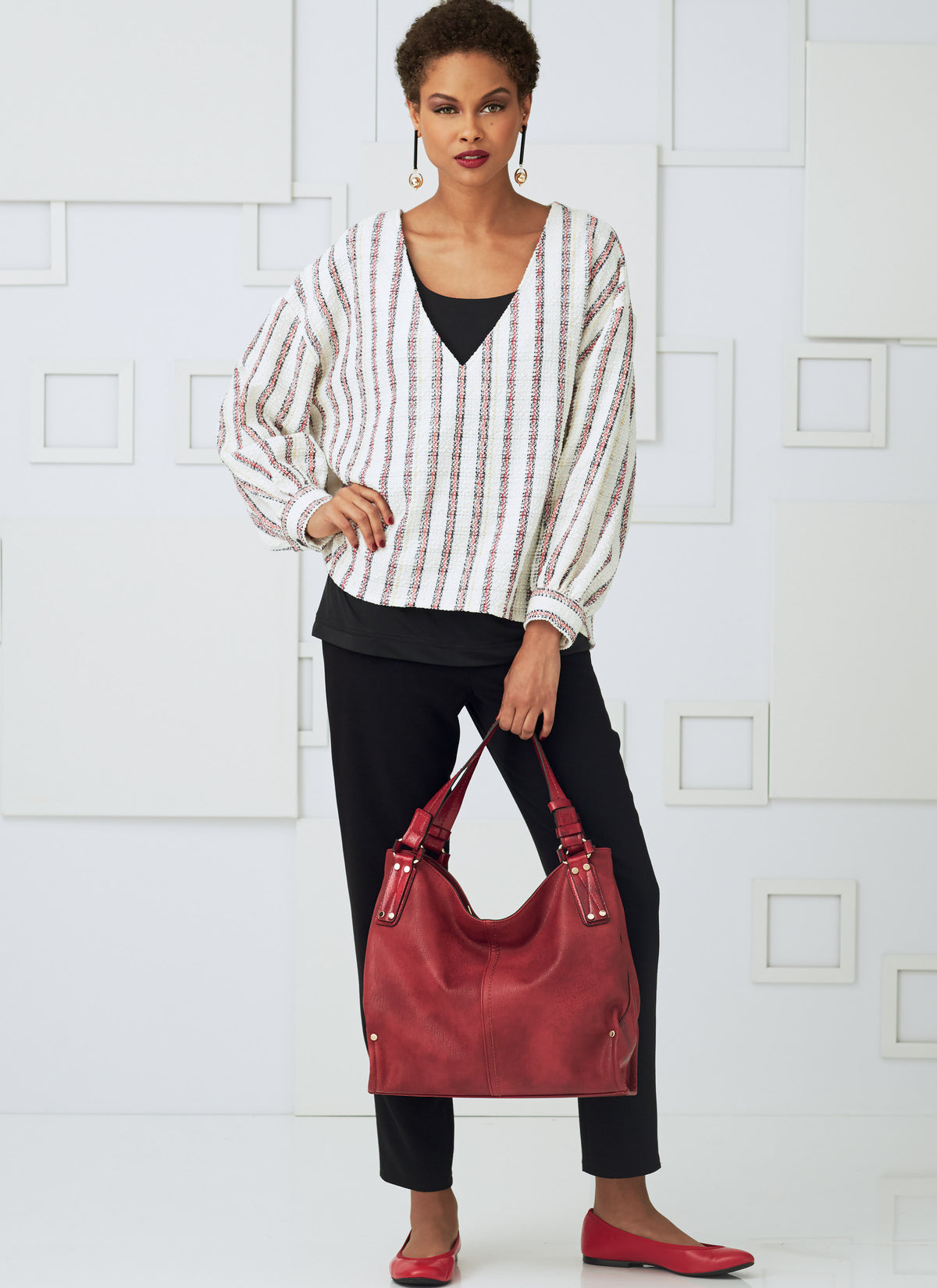 Vogue Patterns V9286 sewing pattern envelope showing the pullover top designs