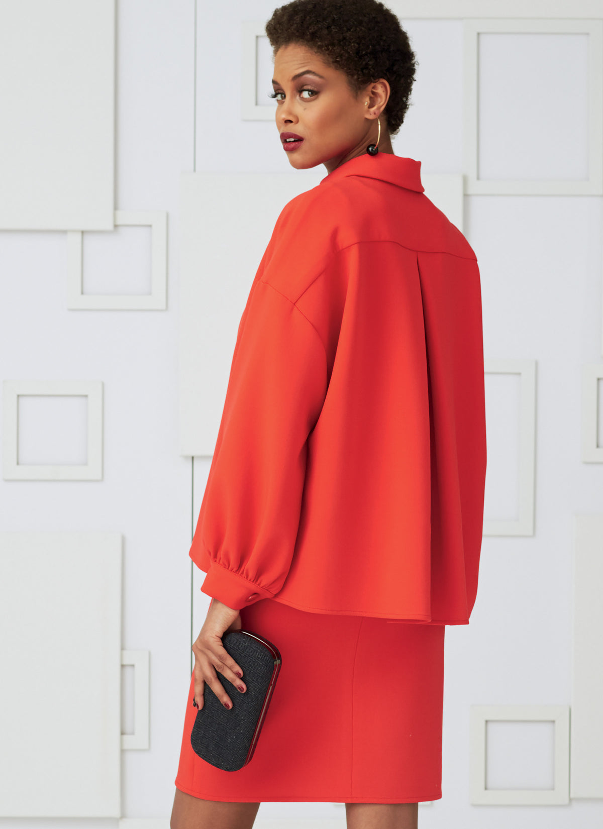 Vogue Patterns V9286 sewing pattern envelope showing the pullover top designs