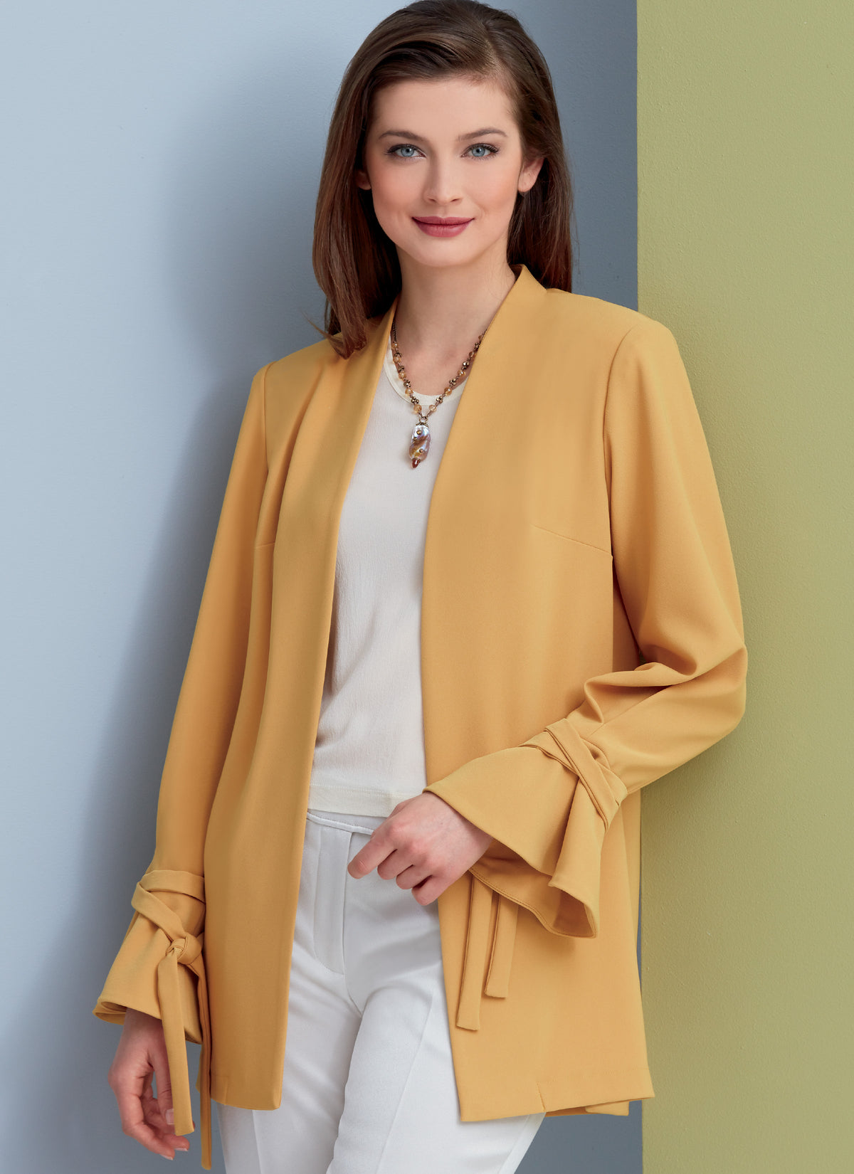 Vogue Patterns V9338 sewing pattern envelope showing the unlined jacket designs