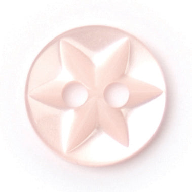 Close-up of soft pink round buttons, 10mm