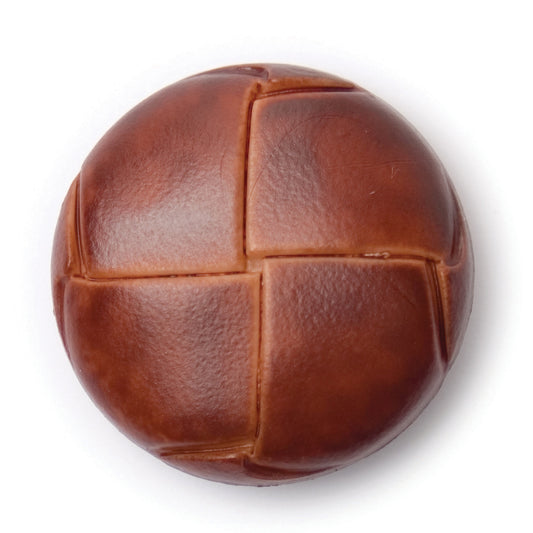 Domed tan button with a woven leather-look finish