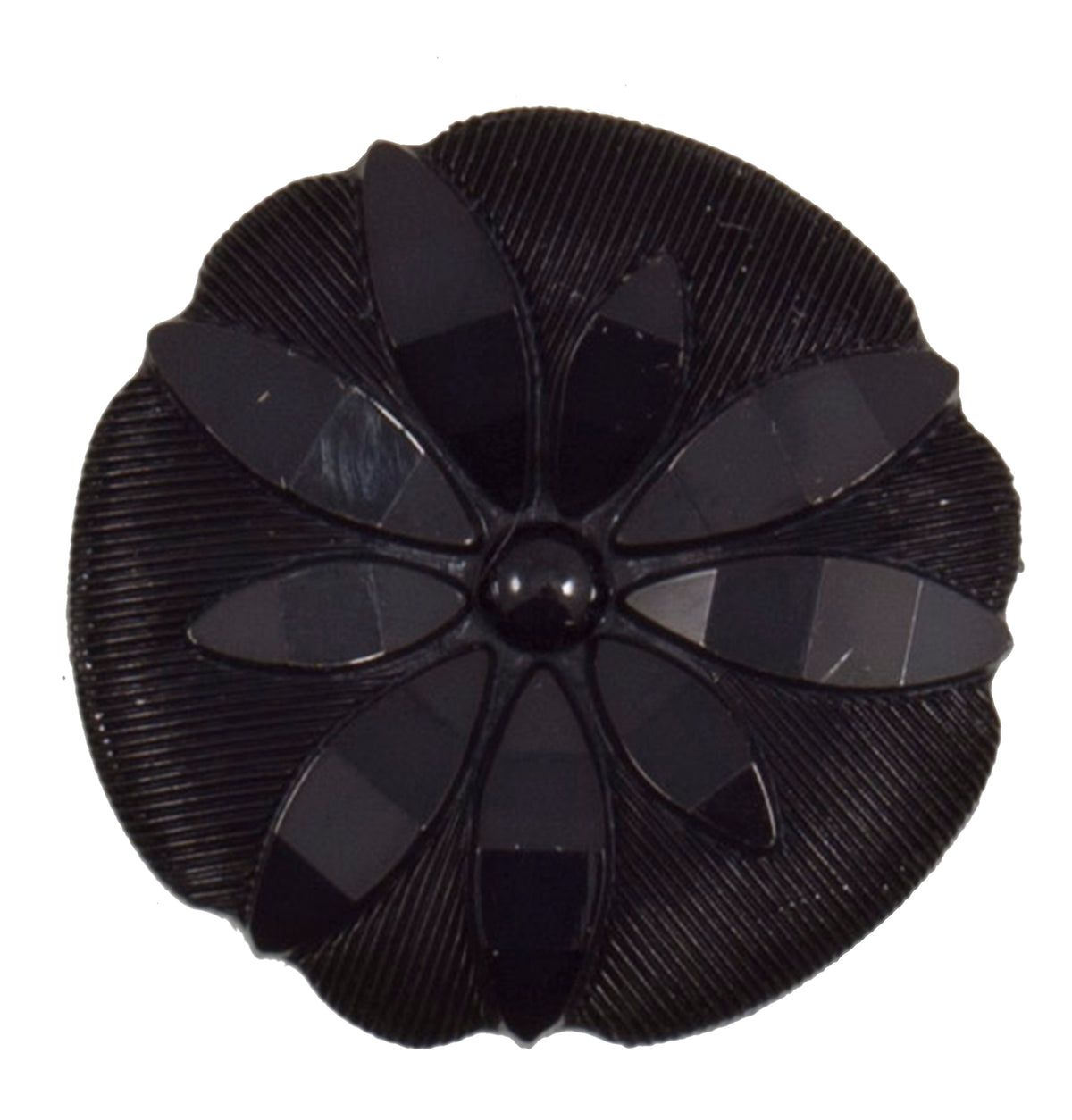 Round black shank button with raised flower design, 25mm