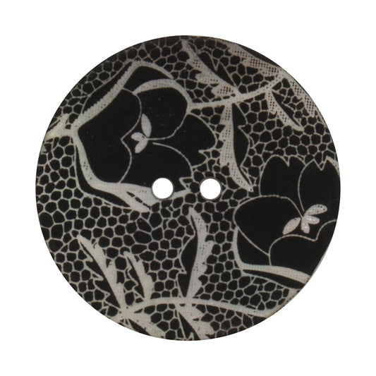 Large black 2-hole button printed with a grey lace and flower pattern