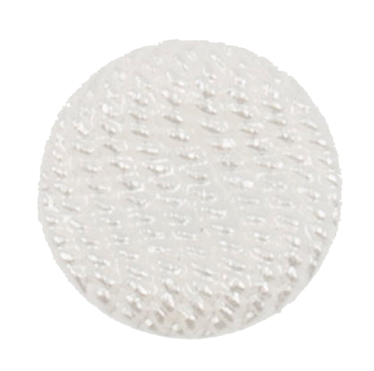 White domed button with a textured surface