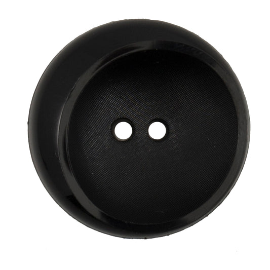 Large black rimmed button with two holes
