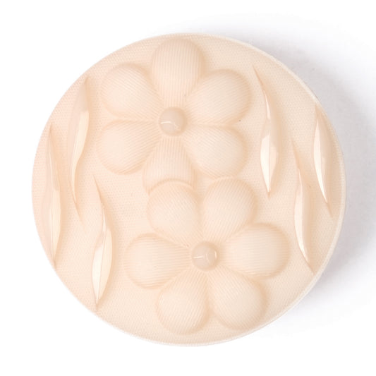 Round peach button with embossed flowers