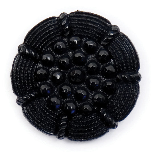 Black button with raised beaded pattern