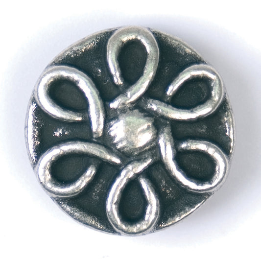 Silver-tone button with a looped knot design set on a dark green background