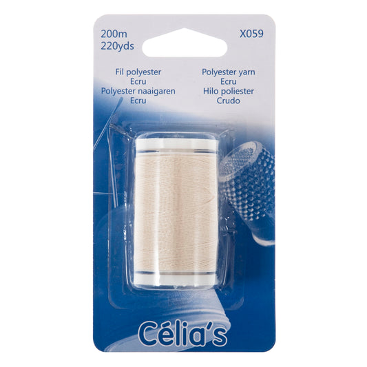 Reel of ecru polyester thread on blue card