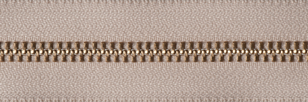 Beige YKK brass metal open end zip, 41cm