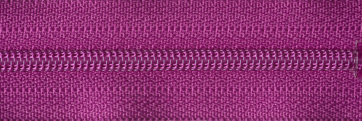YKK 25cm nylon dress and skirt zip in dark fuchsia